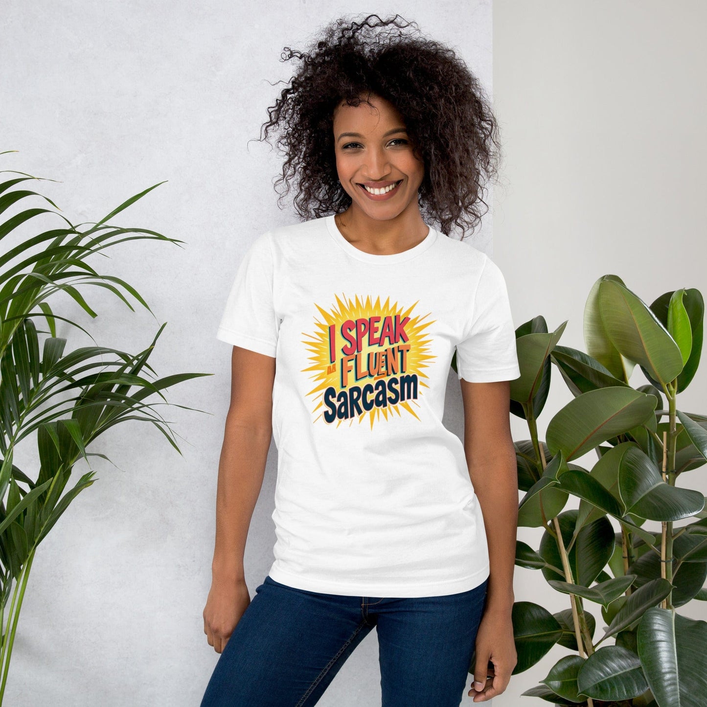 Woman wearing ash T-shirt with bold comic-style I Speak Fluent Sarcasm quote design – ccanvas