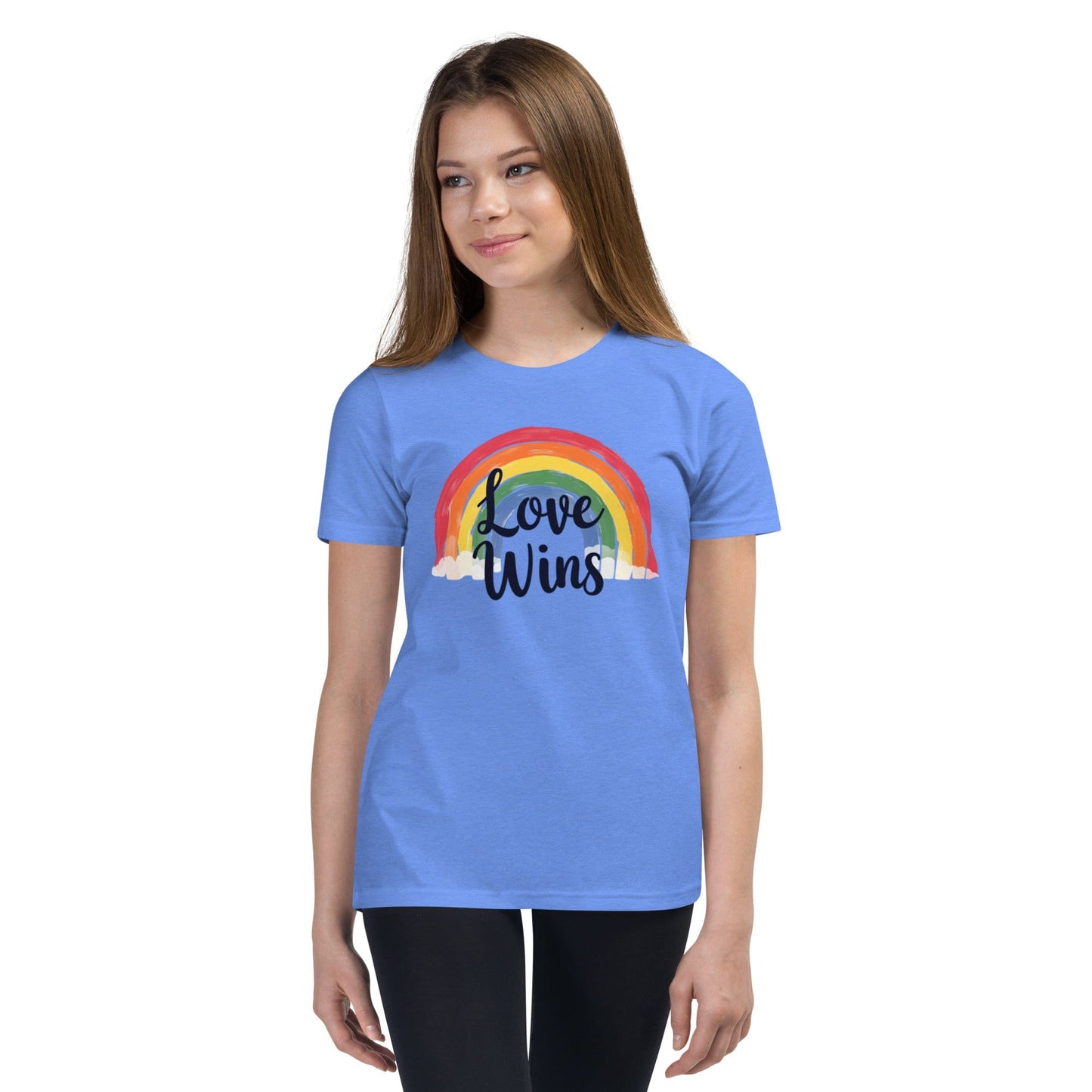 Woman wearing blue Love Wins rainbow pride T-shirt with LGBTQ message – ccanvas