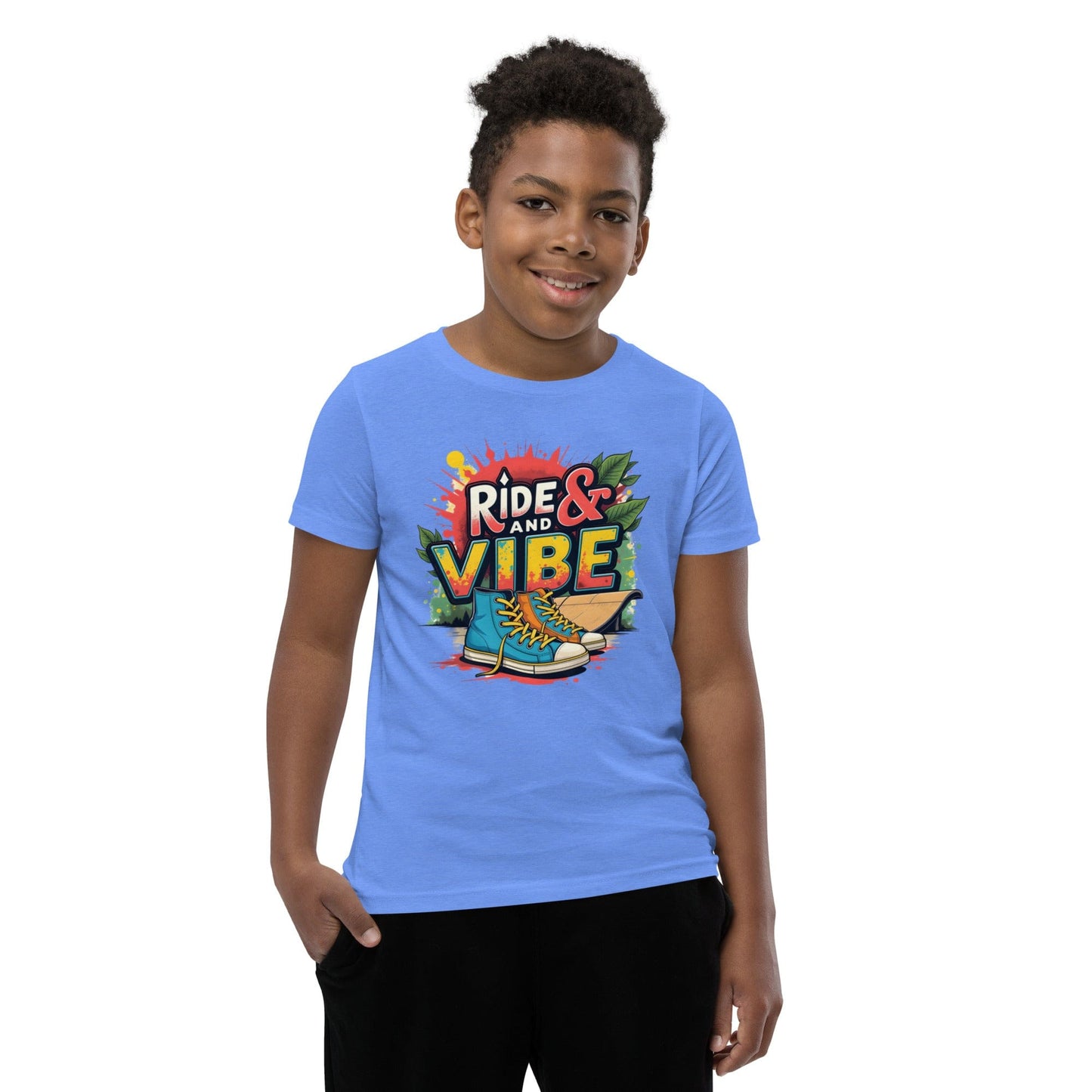 Boy wearing blue T-shirt with “Ride & Vibe” graffiti print, high-top shoes and skateboard over colorful splash – ccanvas