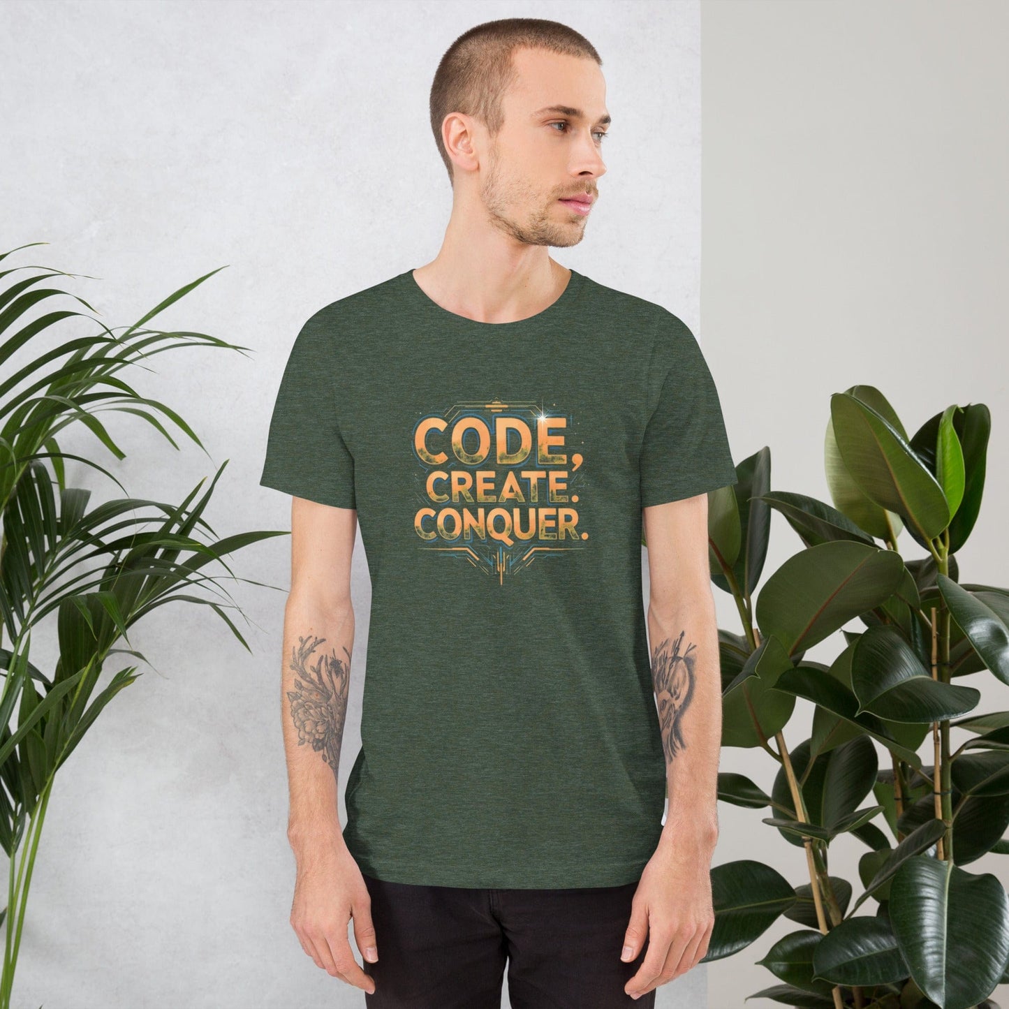 Man wearing busch green tech-style Code Create Conquer T-shirt with orange digital print design – ccanvas