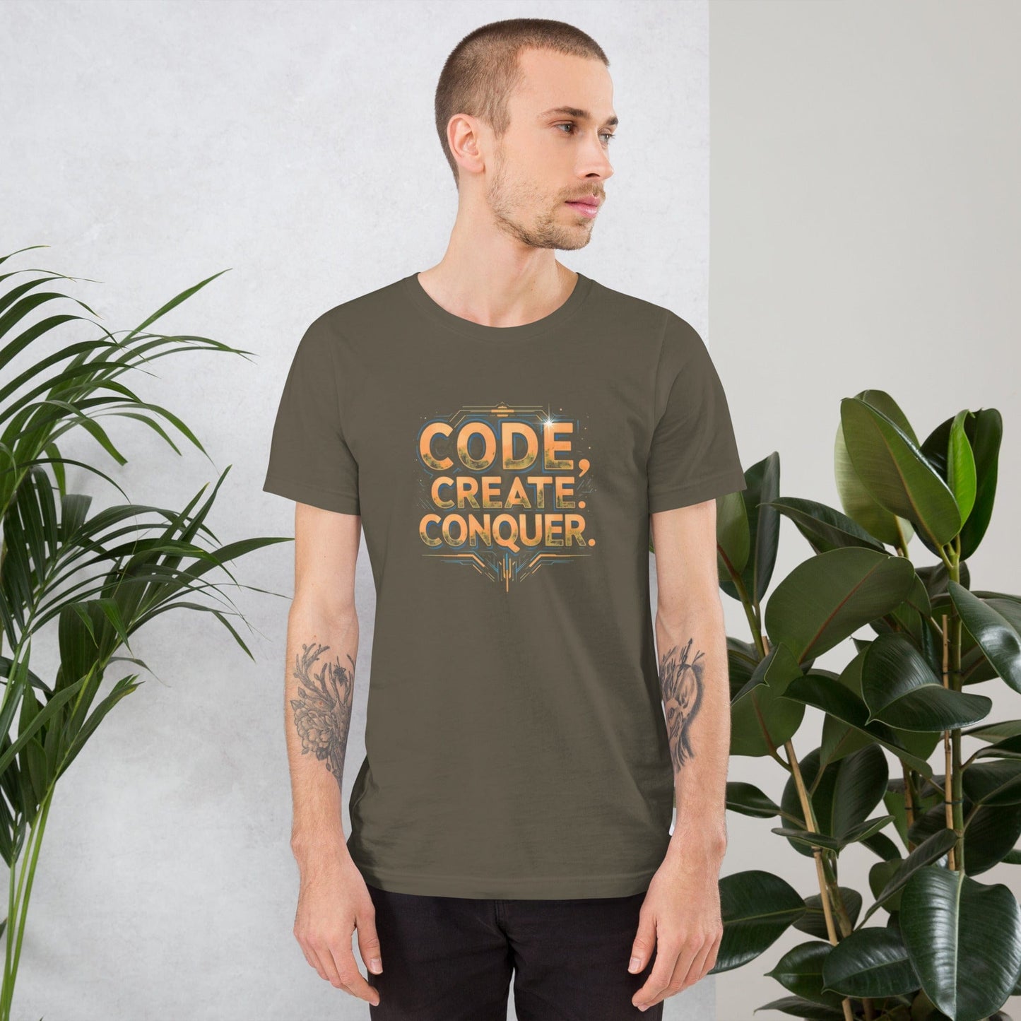 Man wearing dark tech-style Code Create Conquer T-shirt with orange digital print design – ccanvas