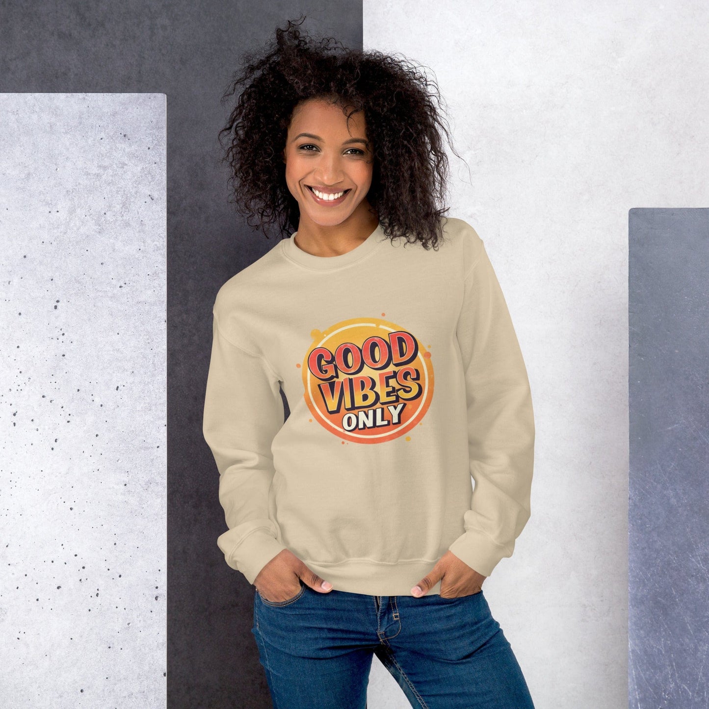 Smiling woman wearing beige sweatshirt with bold retro Good Vibes Only graphic design – ccanvas