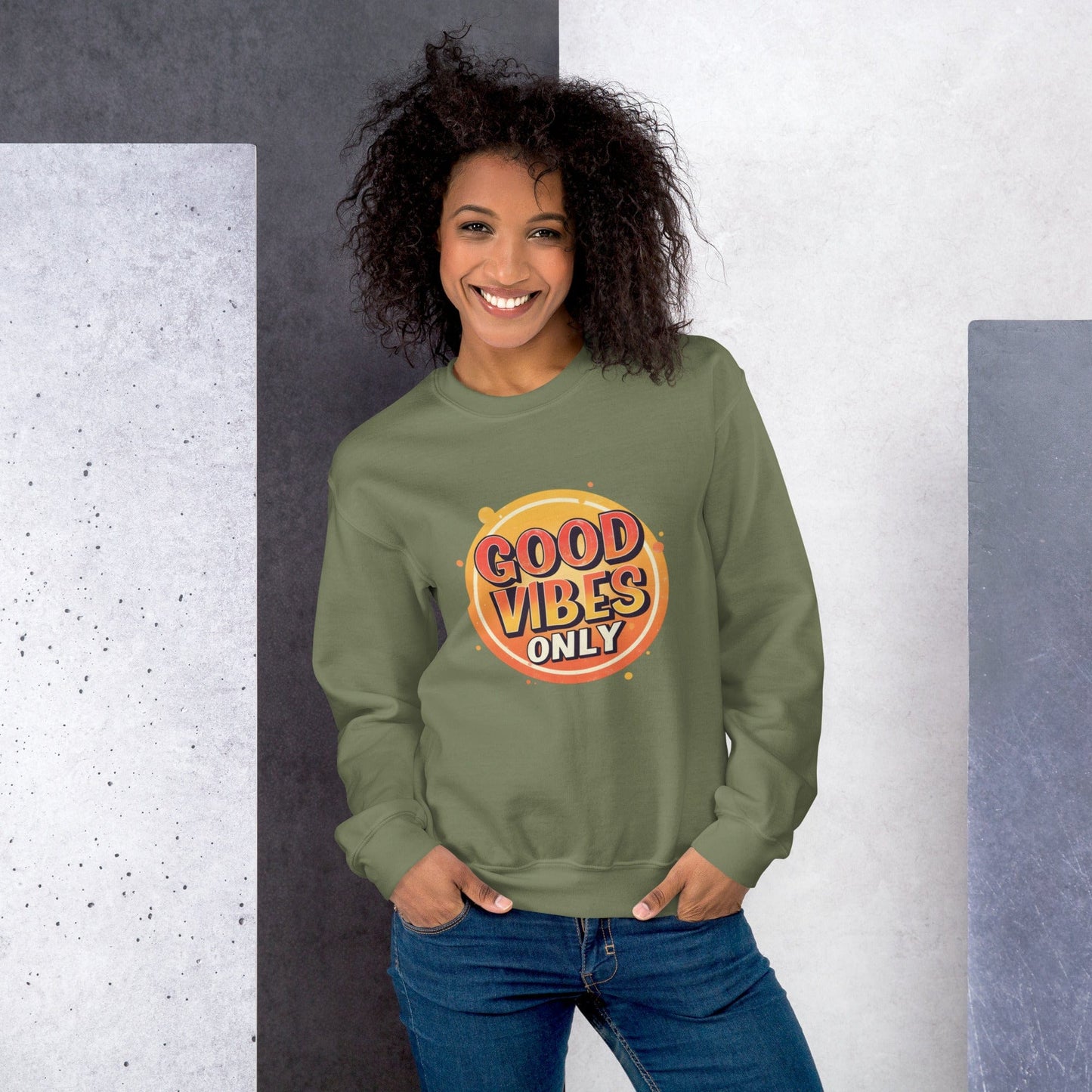 Smiling woman wearing green sweatshirt with bold retro Good Vibes Only graphic design – ccanvas