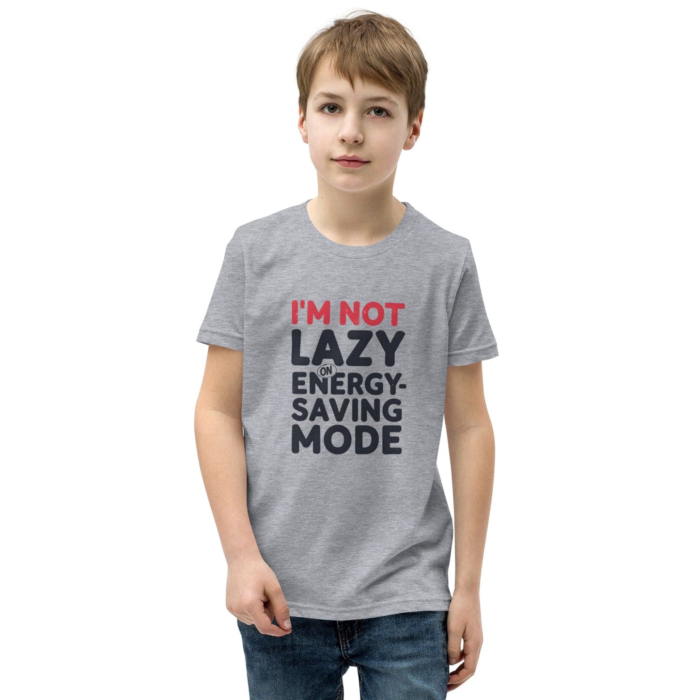 Boy wearing a grey T-shirt with bold quote “I’m not lazy – I’m on energy-saving mode” in red and black print – ccanvas