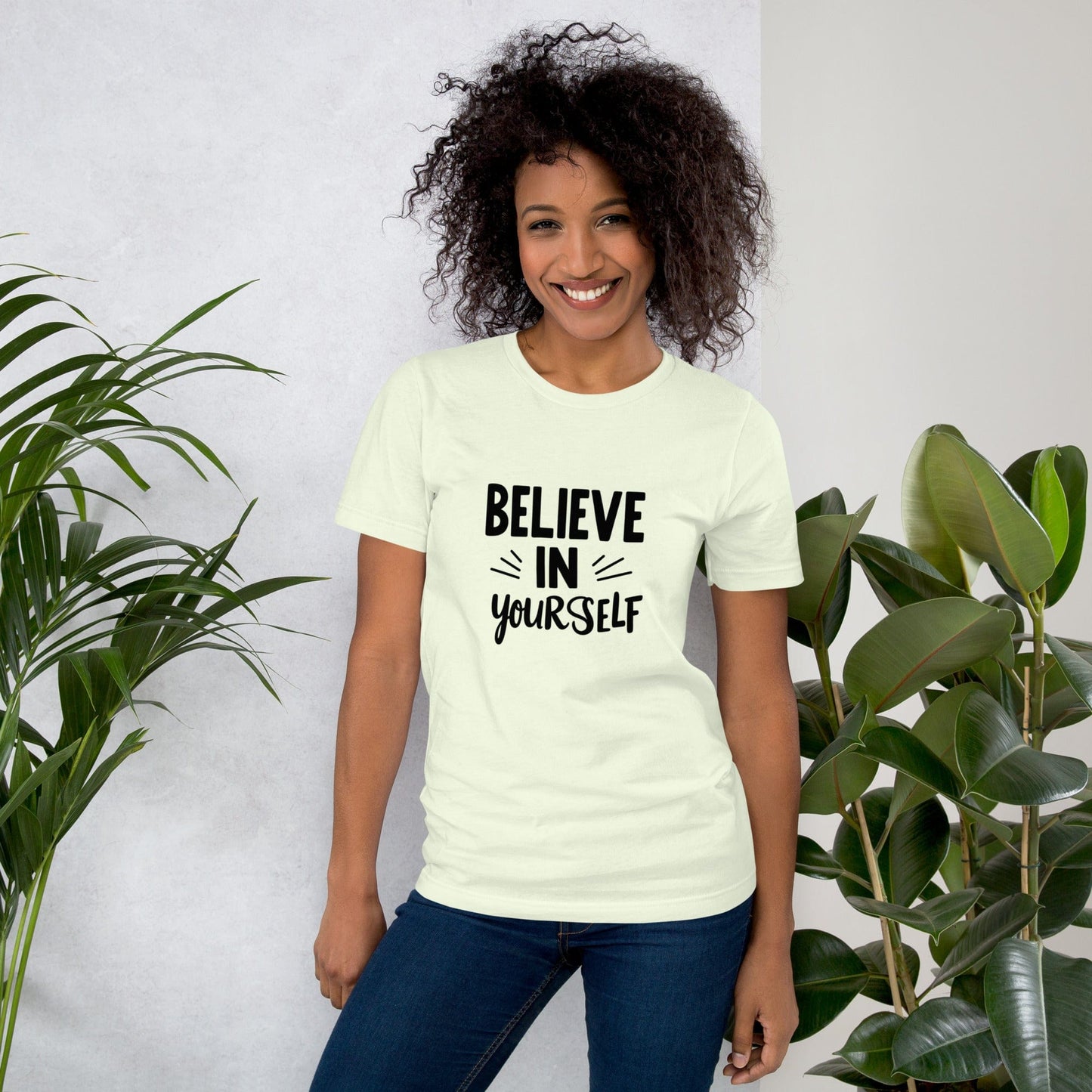 Smiling woman wearing lemon Believe in Yourself T-shirt with black inspirational quote print – ccanvas