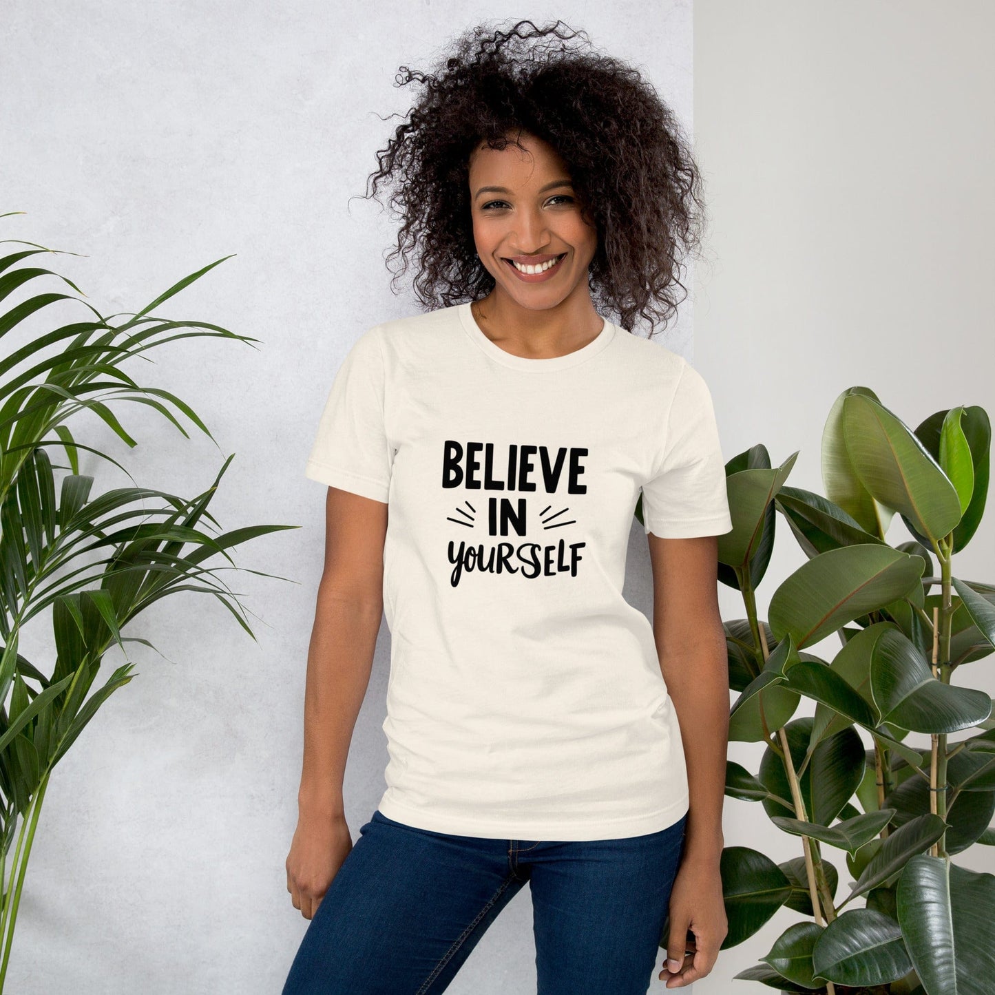 Smiling woman wearing light beige Believe in Yourself T-shirt with black inspirational quote print – ccanvas