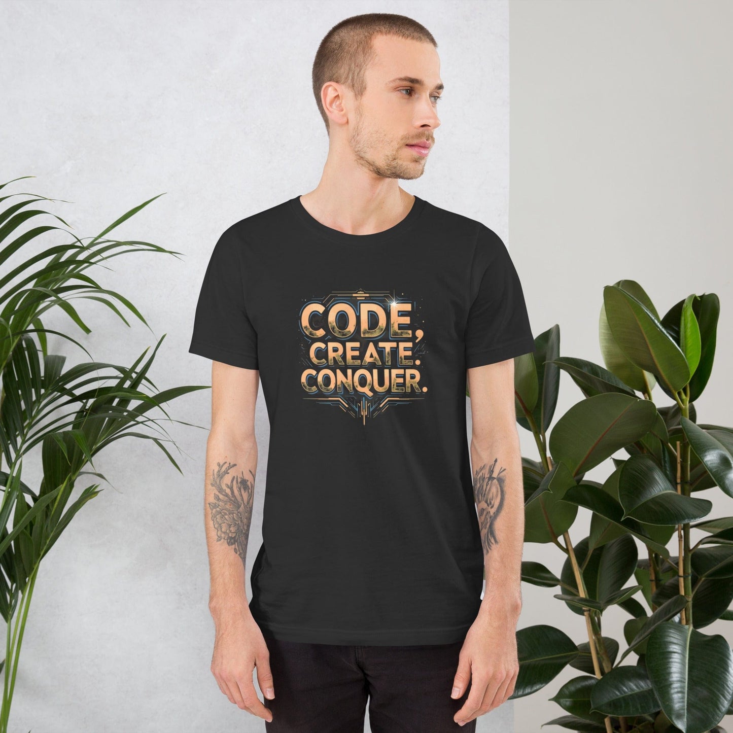 Man wearing light charcoal tech-style Code Create Conquer T-shirt with orange digital print design – ccanvas