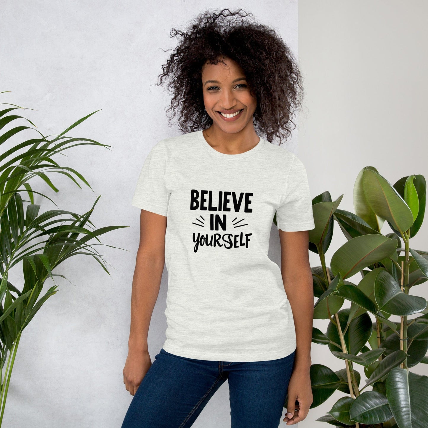 Smiling woman wearing light green Believe in Yourself T-shirt with black inspirational quote print – ccanvas