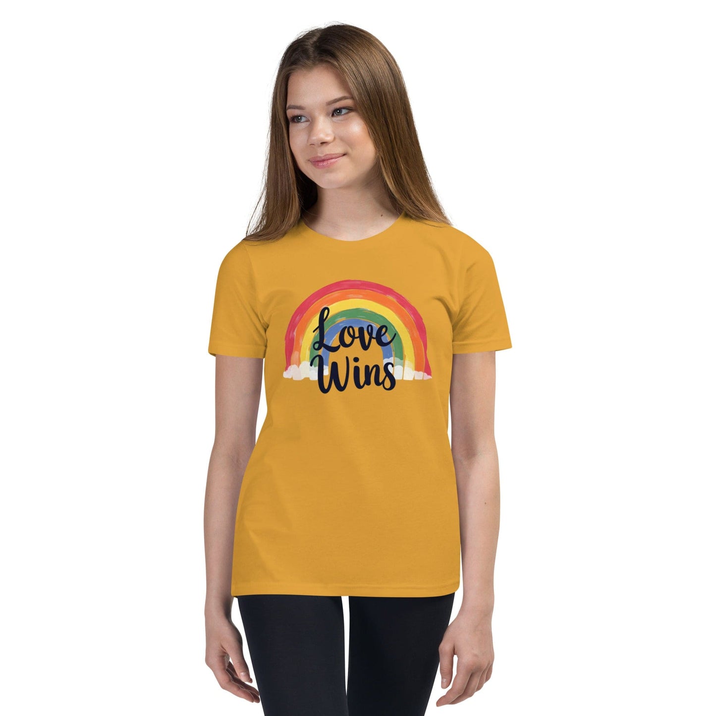 Woman wearing mustard Love Wins rainbow pride T-shirt with LGBTQ message – ccanvas