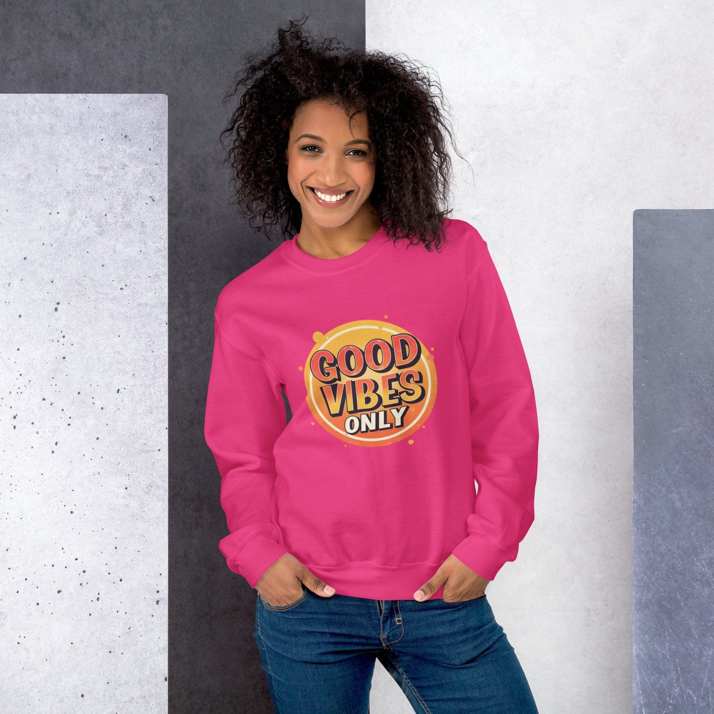 Smiling woman wearing pink sweatshirt with bold retro Good Vibes Only graphic design – ccanvas