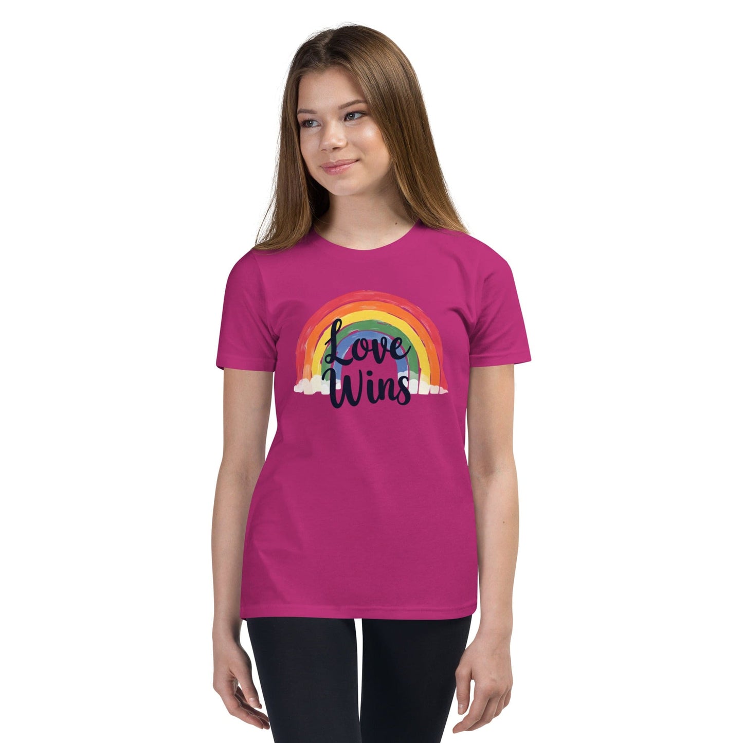 Woman wearing pink Love Wins rainbow pride T-shirt with LGBTQ message – ccanvas