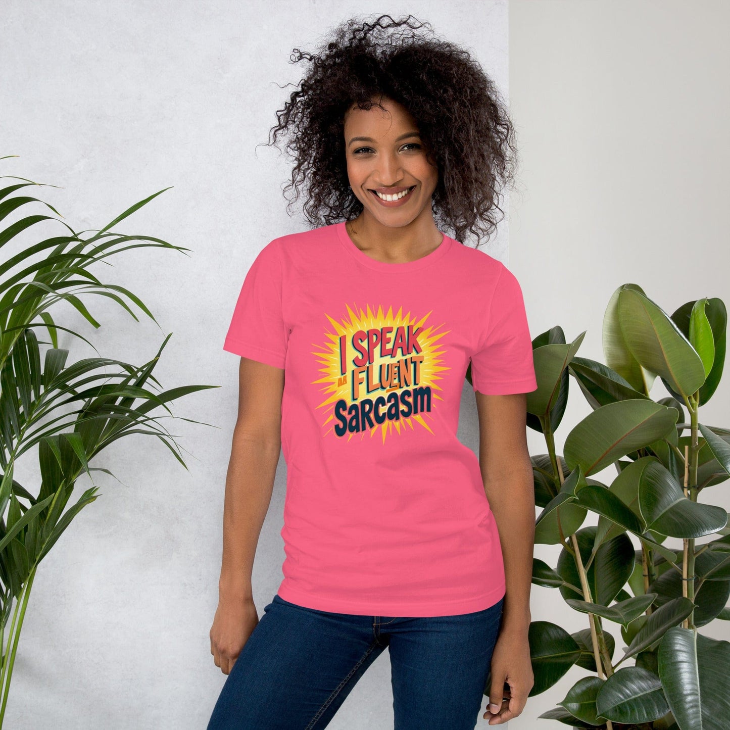 Woman wearing red T-shirt with bold comic-style I Speak Fluent Sarcasm quote design – ccanvas