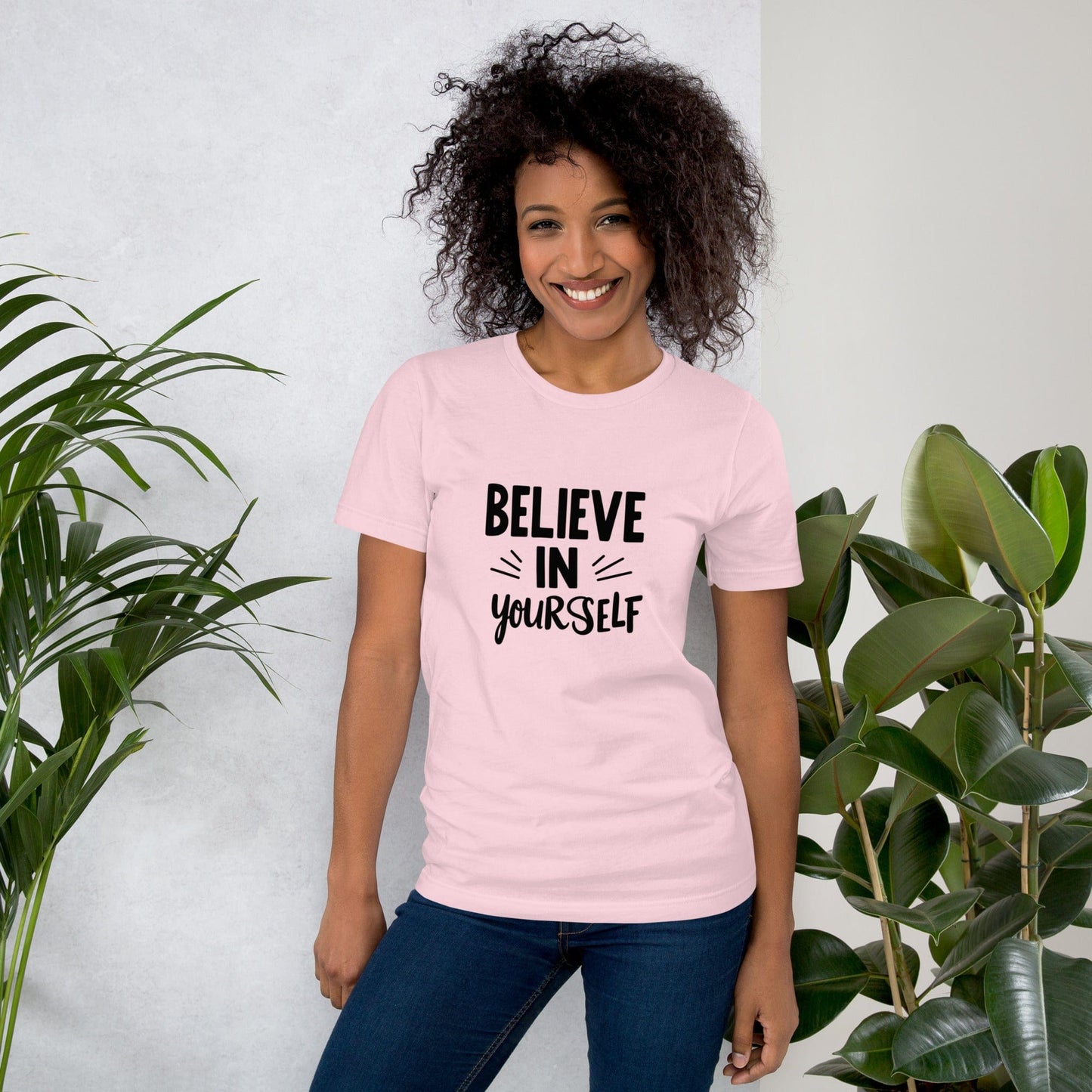 Smiling woman wearing rose Believe in Yourself T-shirt with black inspirational quote print – ccanvas