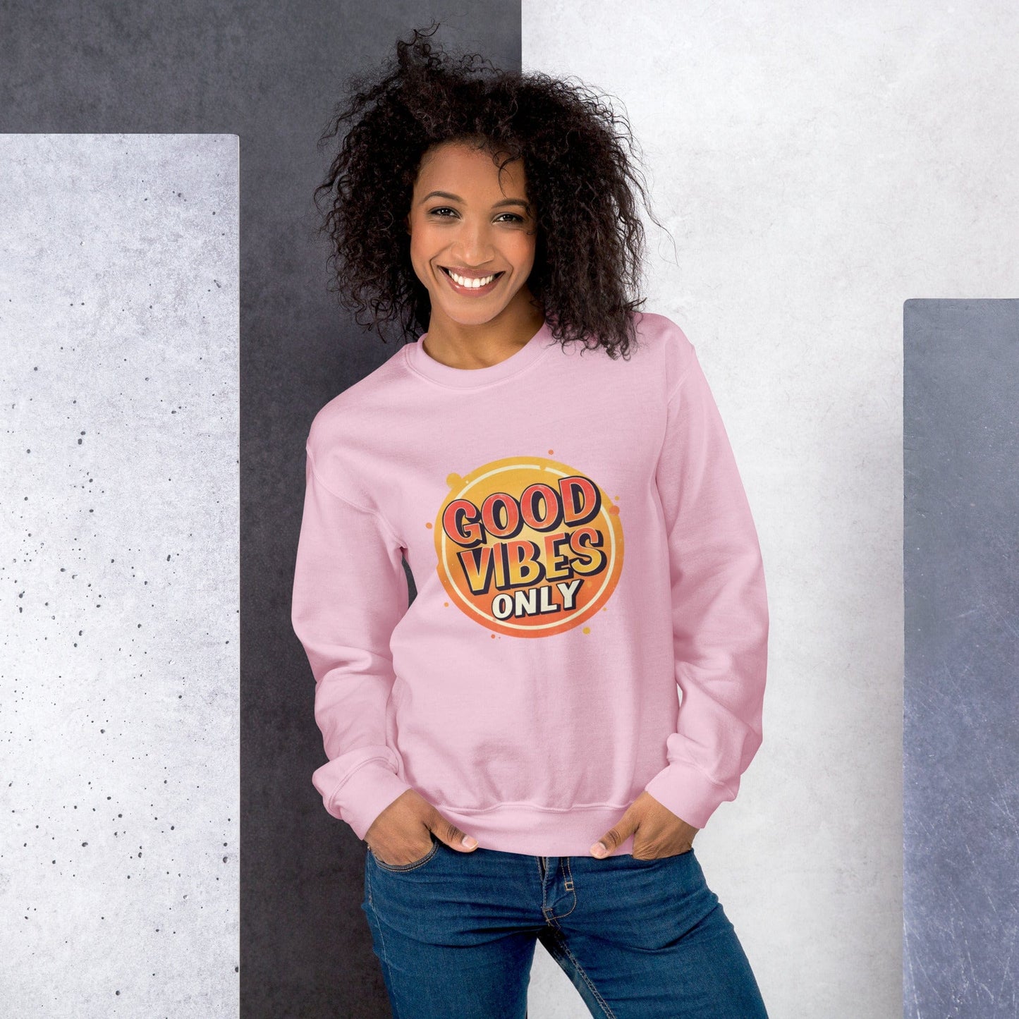 Smiling woman wearing rouge sweatshirt with bold retro Good Vibes Only graphic design – ccanvas