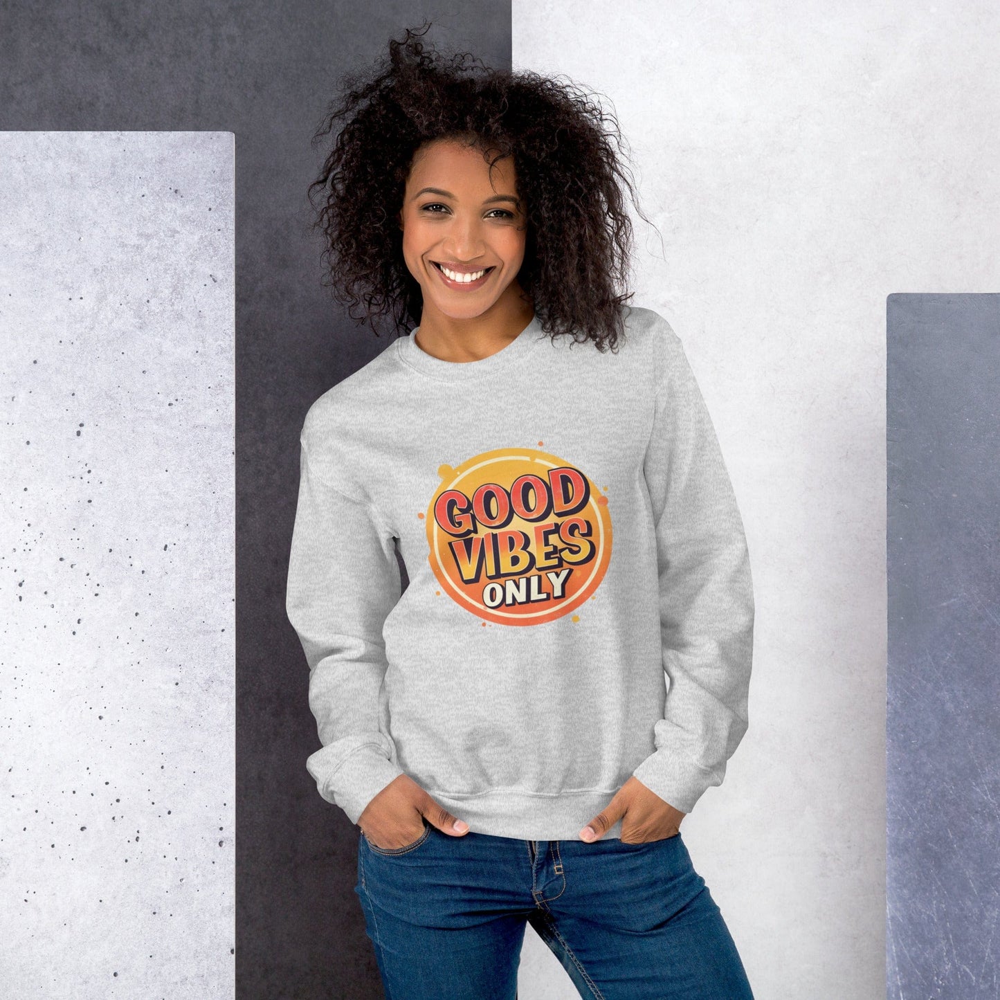 Smiling woman wearingsky grey sweatshirt with bold retro Good Vibes Only graphic design – ccanvas