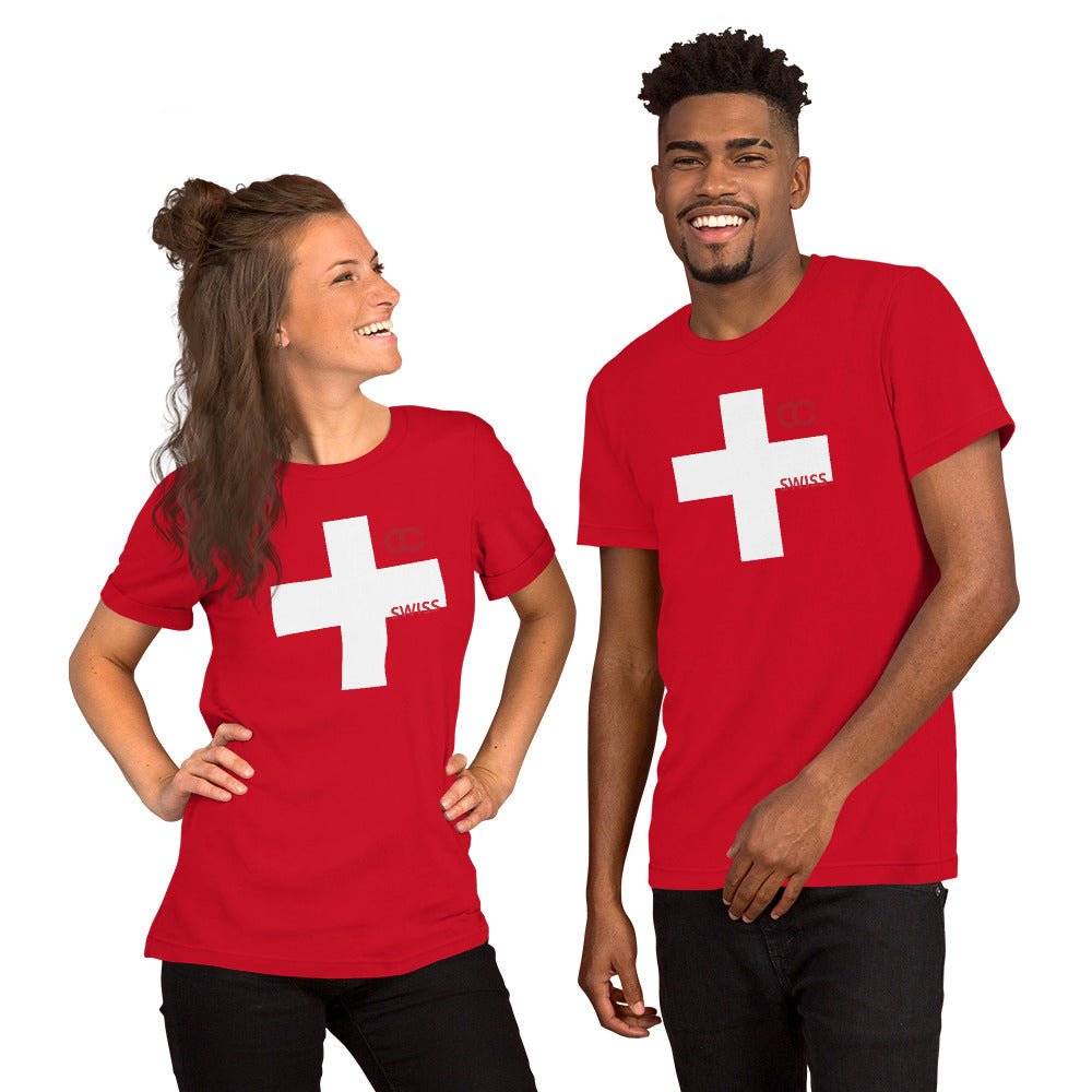 Model wearing a red Swiss heritage t-shirt with a large white Swiss cross by CCANVAS.
