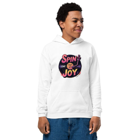 Teen wearing Off white hoodie with colorful retro record design and “Spin Back to the Joy” slogan at ccanvas