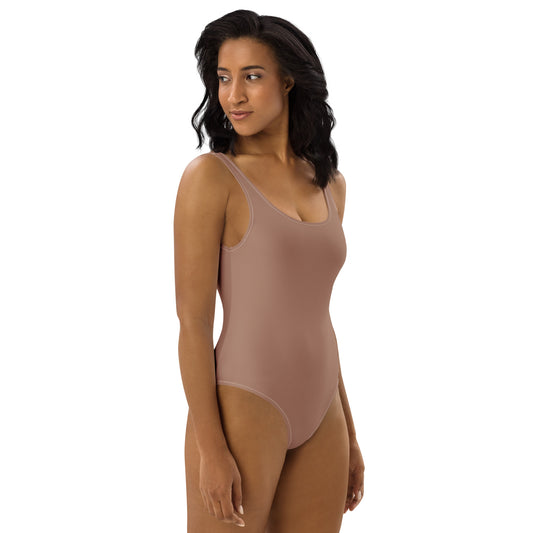 Side profile of women's Slate Taupe sculpted swimsuit highlighting the body-sculpting fit and premium athletic stretch fabric by CCANVAS.