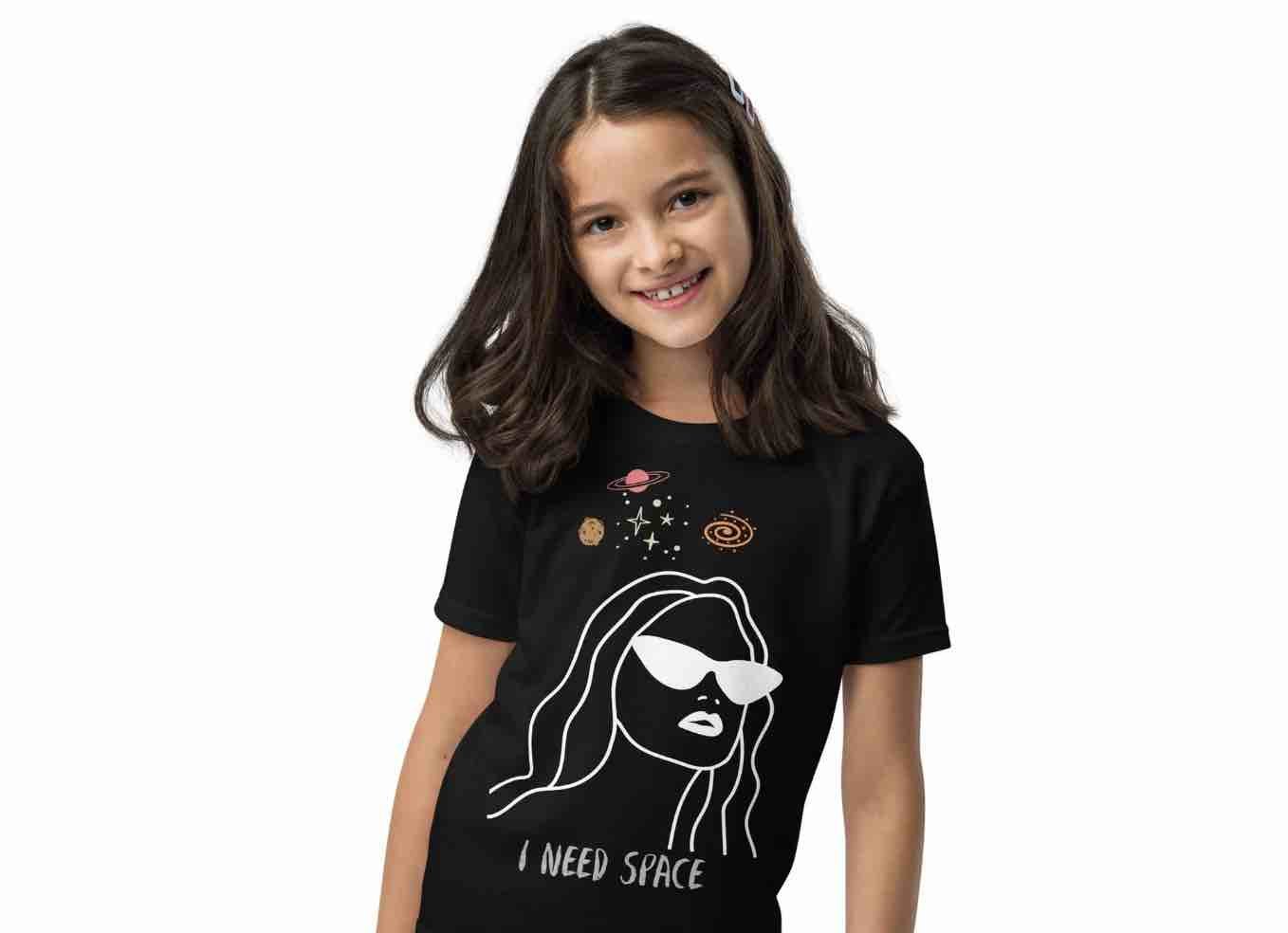 Girl in black “I Need Space” graphic tee from Ccanvas Children’s Collection – bold, playful T-shirt designed for comfort and style