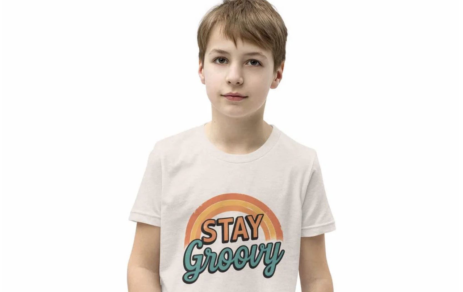 Boy in white “Stay Groovy” T-shirt from Ccanvas Kids T-Shirt Collection – retro slogan tee with bold graphic for everyday play