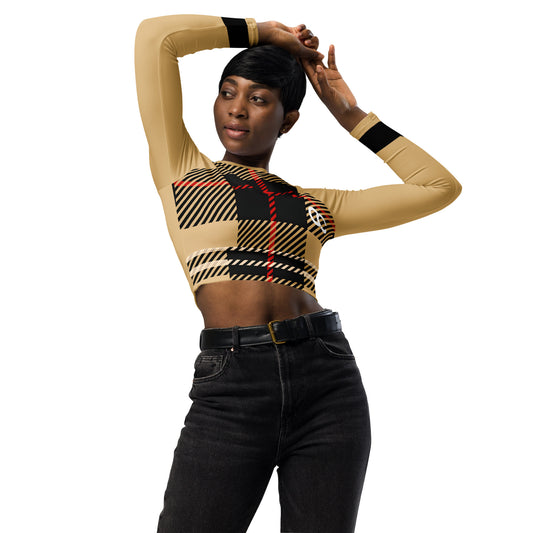 Woman wearing beige long sleeve crop top with red-black plaid center and small logo detail Vs 1
