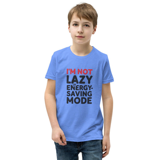 Boy wearing a blue T-shirt with bold quote “I’m not lazy – I’m on energy-saving mode” in red and black print – ccanvas