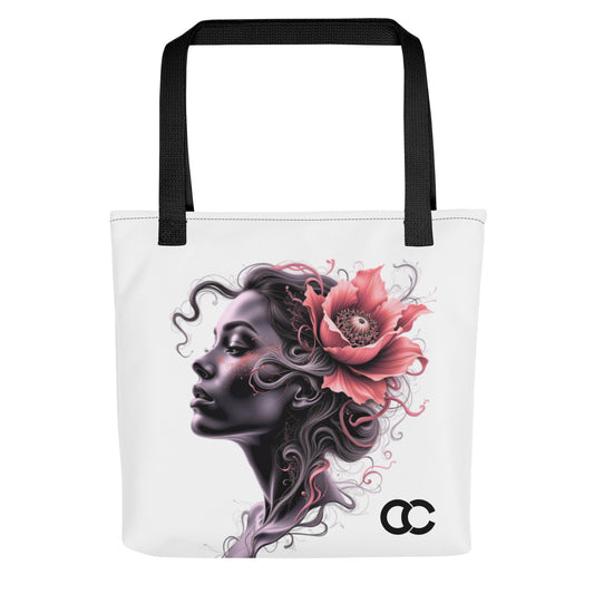 Ethereal woman profile portrait with a large blooming pink flower in her hair on a white heavyweight canvas tote by CCANVAS.
