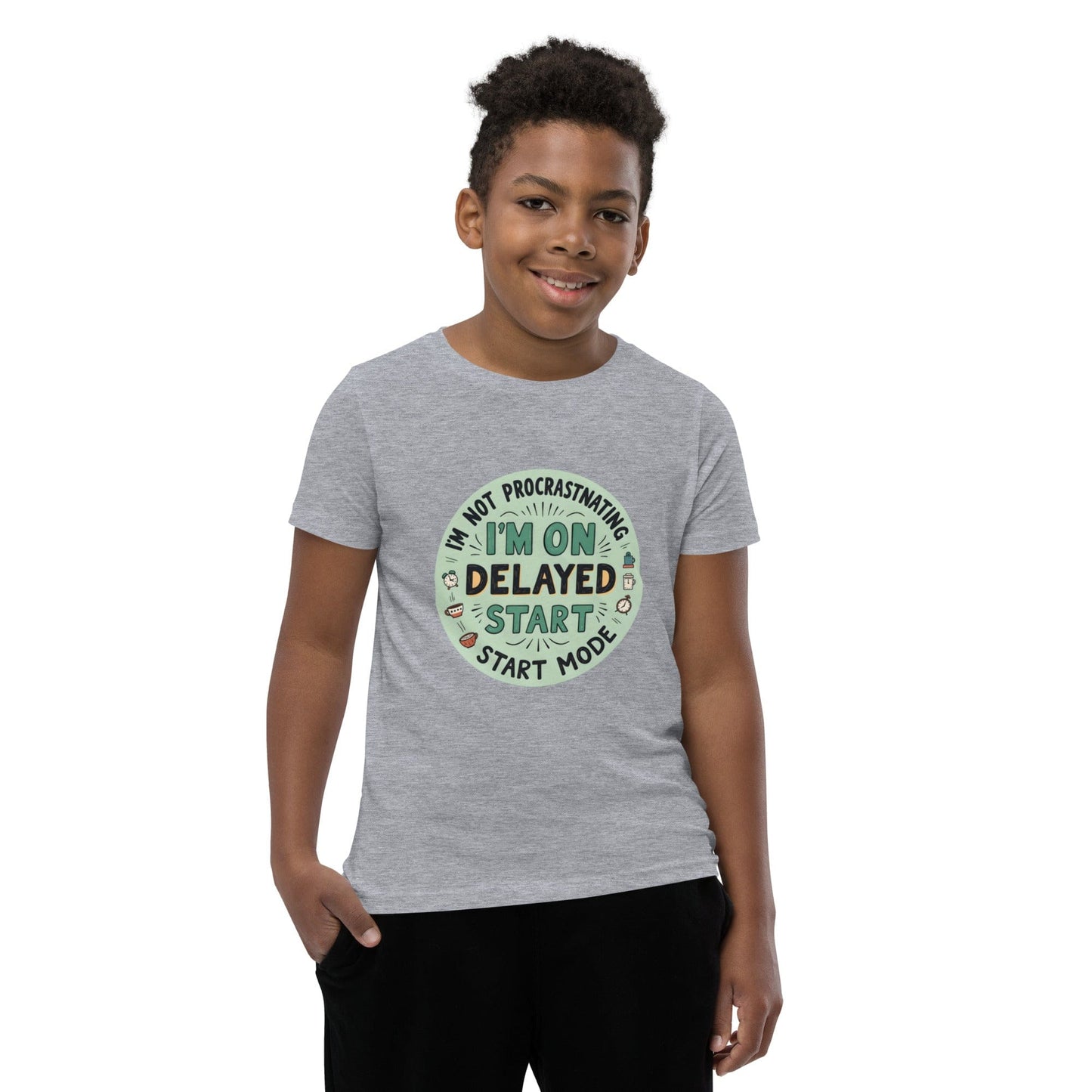Child wearing grey T-shirt with “I’m on delayed start mode” funny quote in round colorful design – max impact print – ccanvas