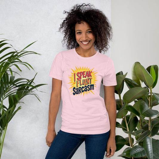 Woman wearing pink T-shirt with bold comic-style I Speak Fluent Sarcasm quote design – ccanvas