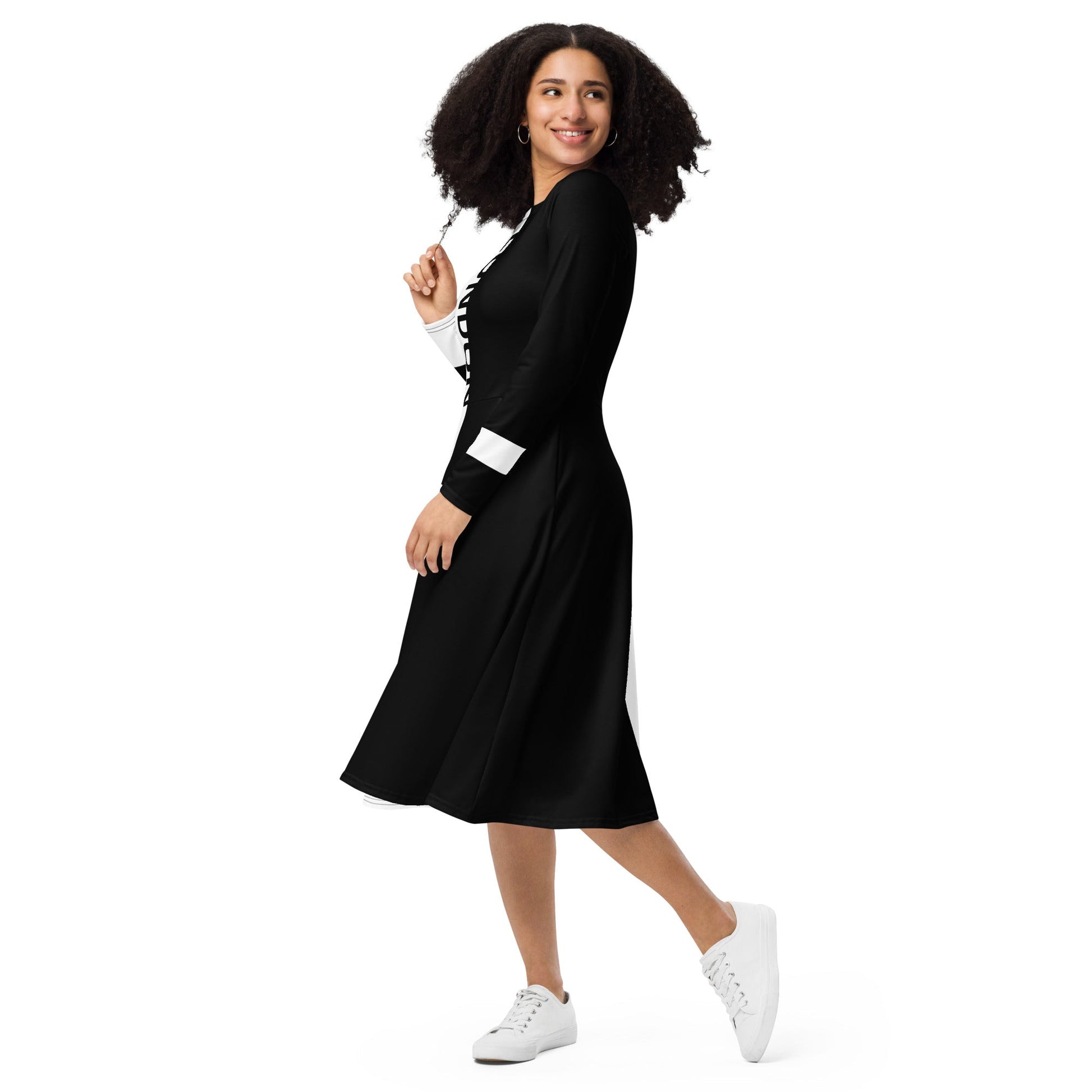 Woman wearing black and white split midi dress with bold vertical “London” text – ccanvas Vs 2