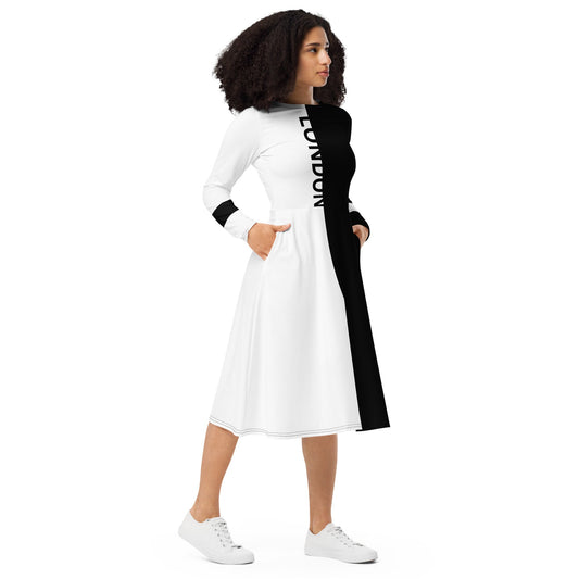 Woman wearing black and white split midi dress with bold vertical “London” text – ccanvas Vs 3