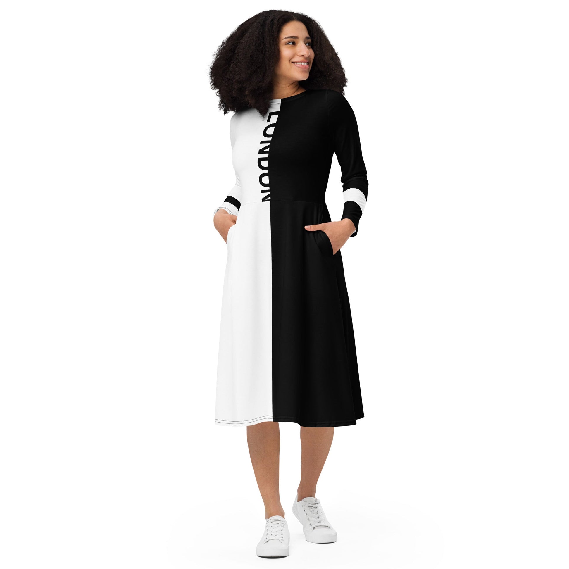 Woman wearing black and white split midi dress with bold vertical “London” text – ccanvas