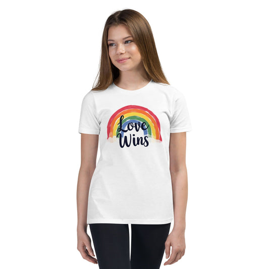 Woman wearing Off White Love Wins rainbow pride T-shirt with LGBTQ message – ccanvas
