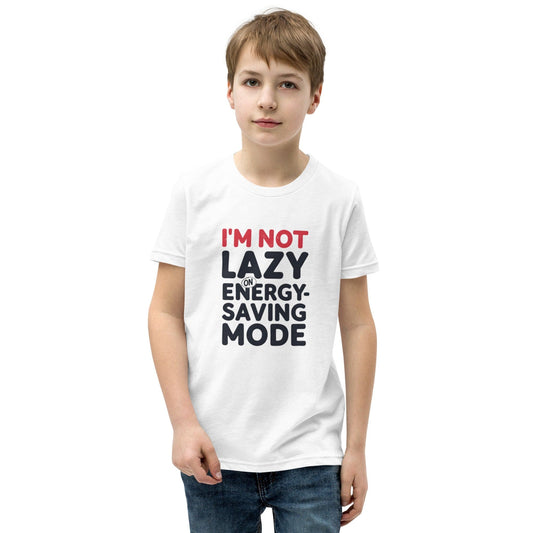 Boy wearing a Off white T-shirt with bold quote “I’m not lazy – I’m on energy-saving mode” in red and black print – ccanvas