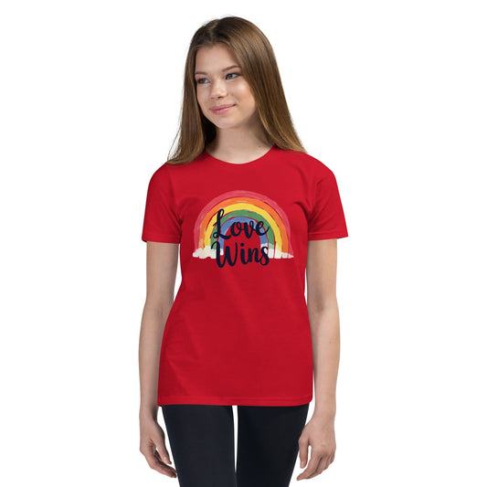 Woman wearing red Love Wins rainbow pride T-shirt with LGBTQ message – ccanvas