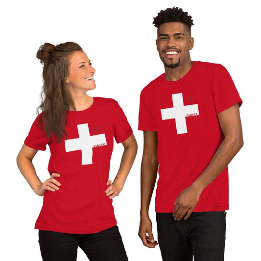 Model wearing a red Swiss heritage t-shirt with a large white Swiss cross by CCANVAS.
