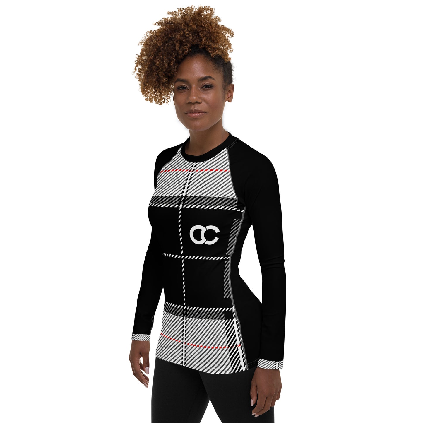 Three-quarter view of model styling the urban plaid performance rash guard for an athletic 2026 streetwear aesthetic.

