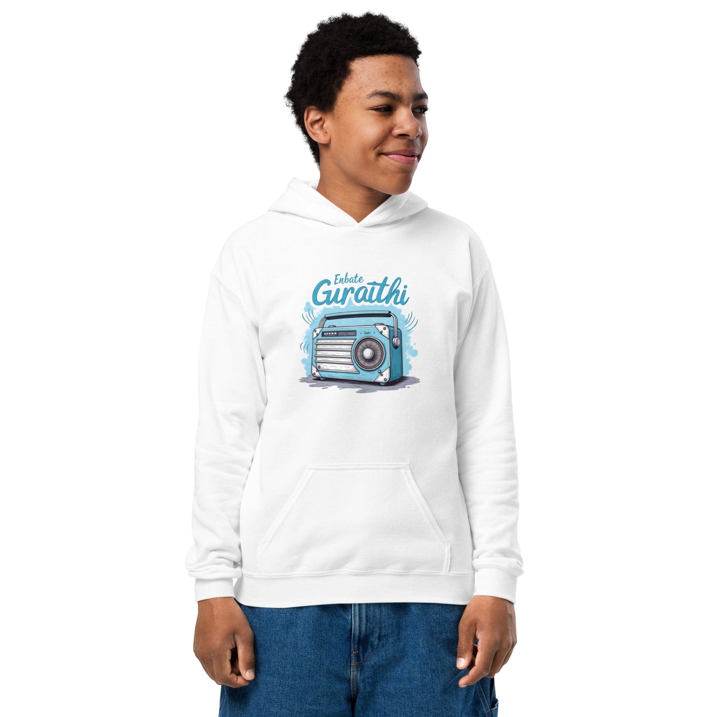 Teen wearing Off White hoodie with vintage radio and “Iskulte Guraathi” slogan in playful style at ccanvas