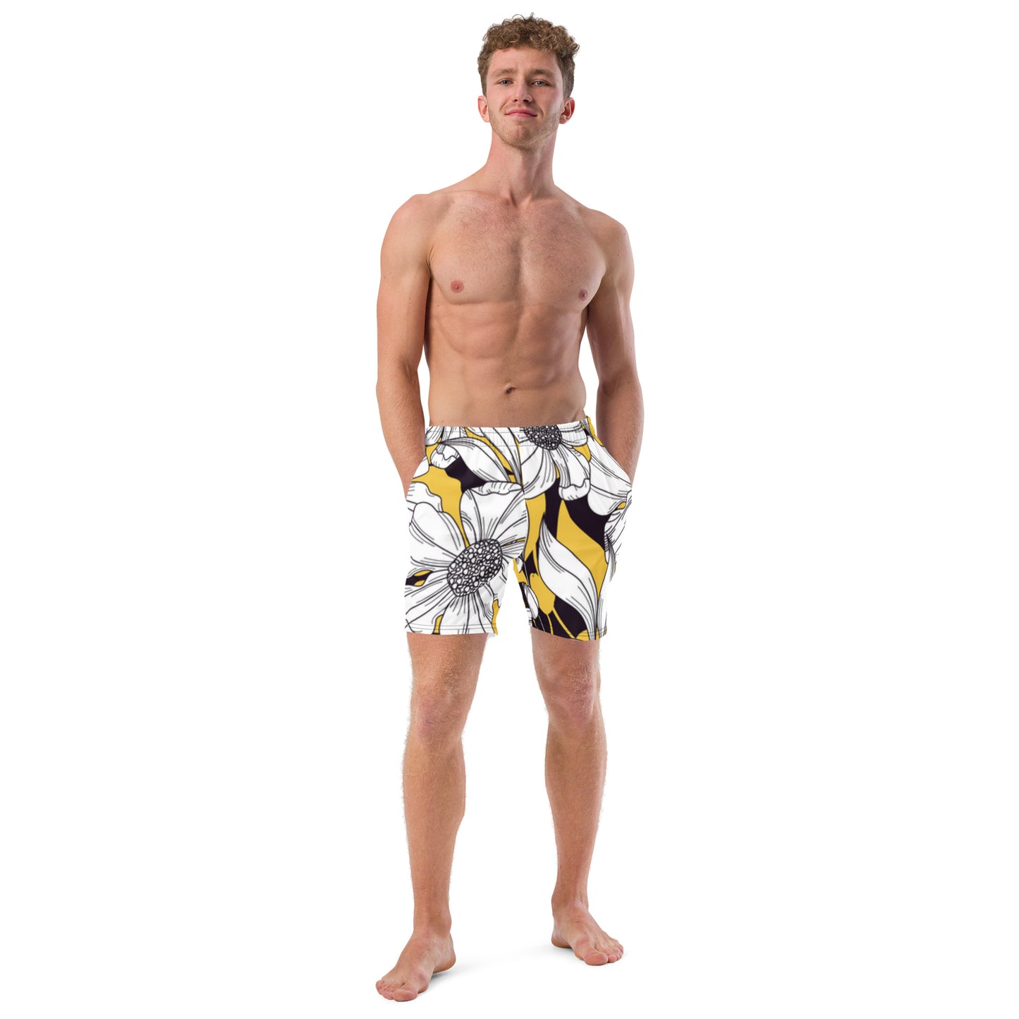 Front view of men's Ethereal Bloom swim shorts featuring a large monochrome floral print with yellow accents by CCANVAS.
