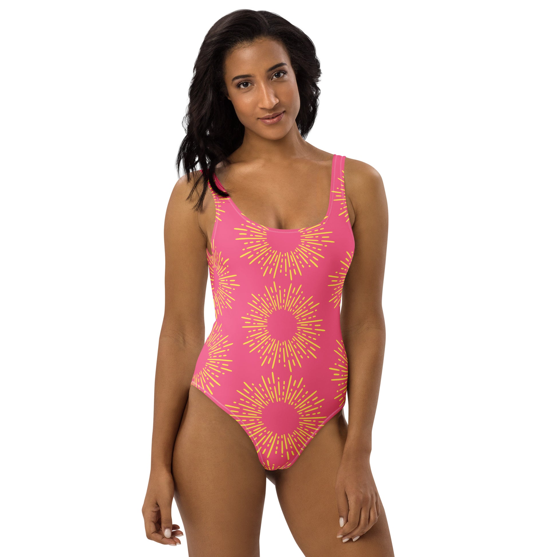 Front view of Neon Sunburst one-piece swimsuit with scoop neckline and vibrant 90s retro sun pattern by CCANVAS.
