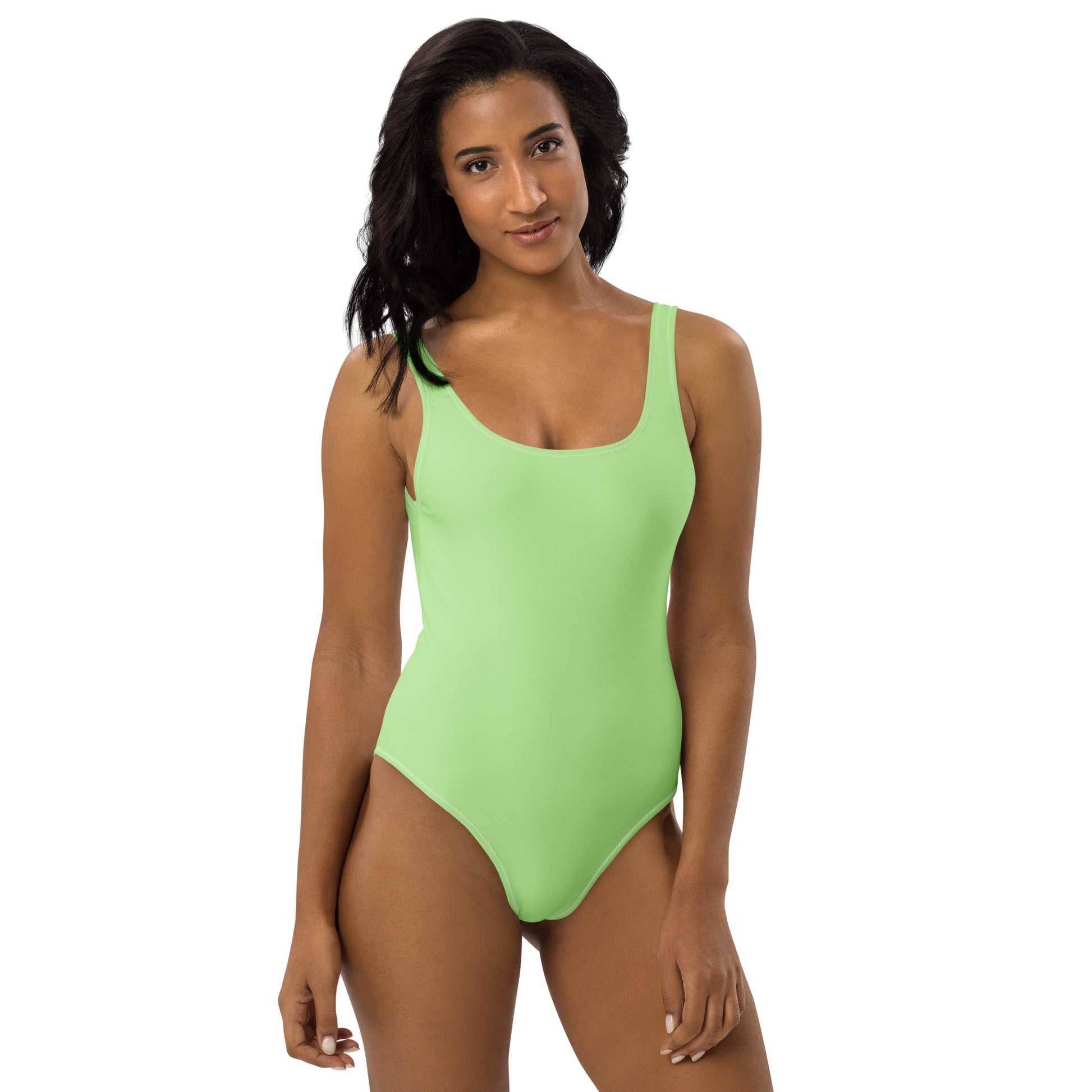 Front view of women's Lime Muse one-piece swimsuit in neon electric lime featuring a scoop neckline and stretch fit by CCANVAS.
