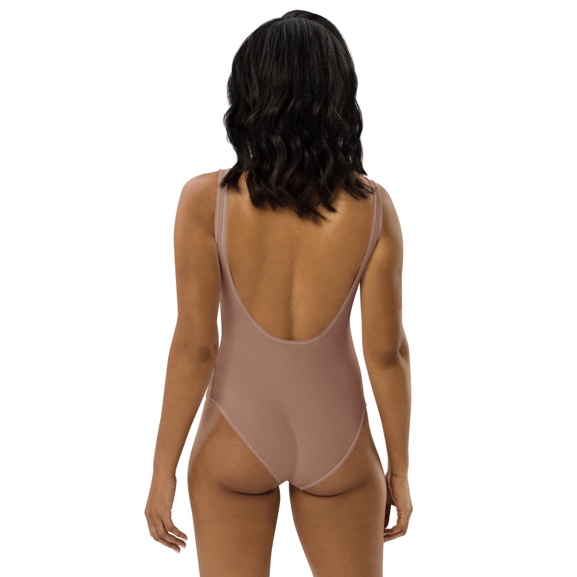 Rear view of women's Slate Taupe swimsuit showing the dramatic low-scoop back and high-cut athletic silhouette by CCANVAS.
